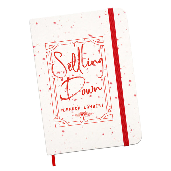 Journal with "Settling Down, Miranda Lambert" on front, elastic closure, and ribbon bookmark.